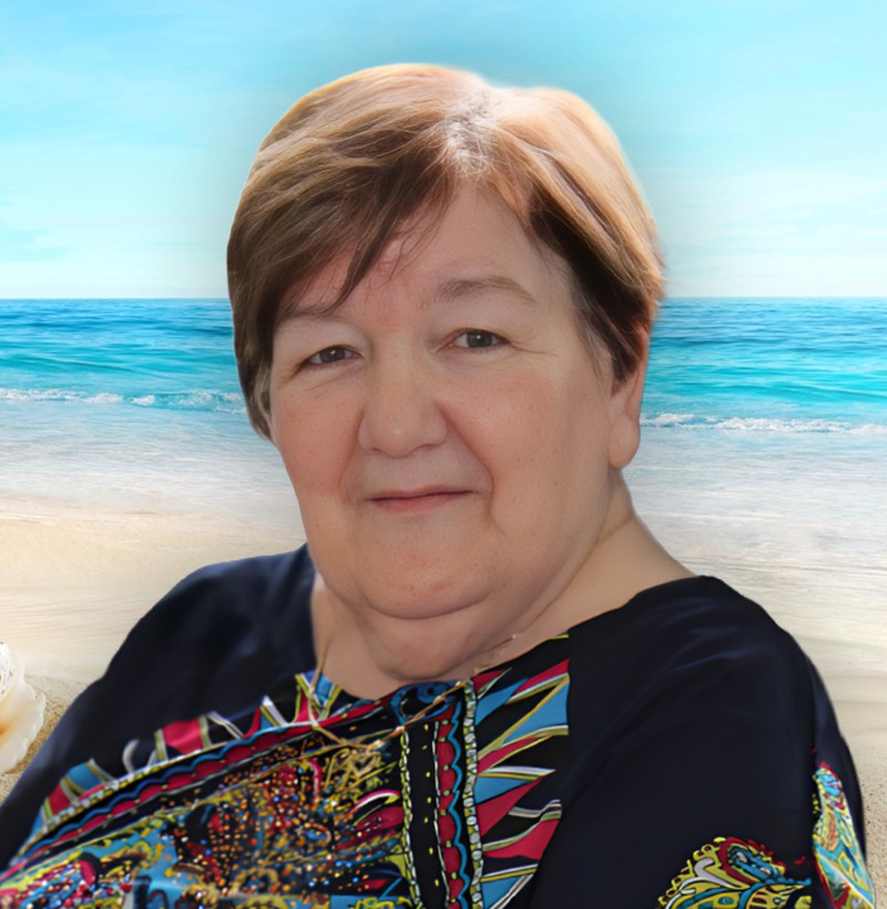 Mme Lily Caron