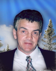 Hommage à M. Guy Harrisson